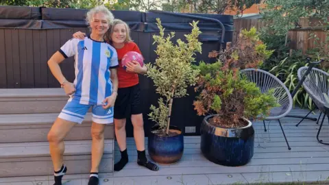 Noelia Noel Noelia and Noam in their garden