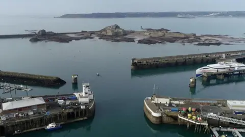 BBC An aerial shot of Jersey's ports.