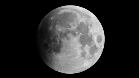 Soleil/BBC Weather Watchers The Moon is pictured up close. Its craters  are visable. 