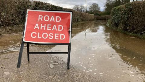 A road closed by flooding
