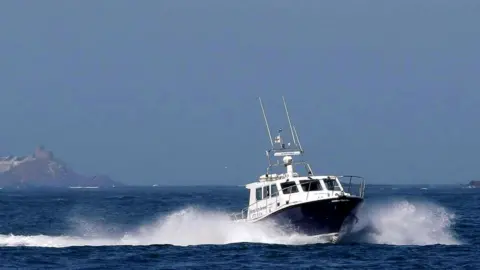 Alderney Ferry Services Alderney ferry travelling in the water with a view of some land behind