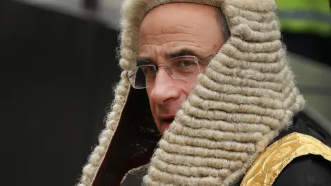 Getty Images Sir Brian Leveson wearing a periwig in his former role as Lord Justice Leveson in 2013
