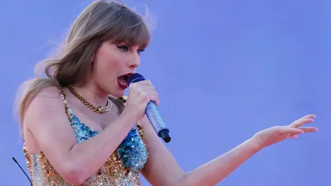 PA Media Taylor Swift sings on-stage