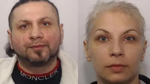 Two mugshots side by side of a man and a woman. The man has dark hair and a goatee and the woman has light blond hair. 