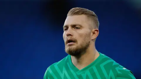 James Baylis - AMA/Getty Images Port Vale goalkeeper Connor Ripley 