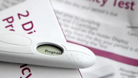 PA Media A positive pregnancy test.
