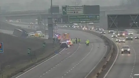 Emergency services at the scene of a crash on the A14 carriageway.