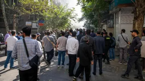 Reuters A crowd of Iranians in Tehran