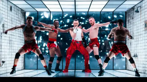 PA Media Olly Alexander performing Dizzy at the Eurovision Song Contest in 2024
