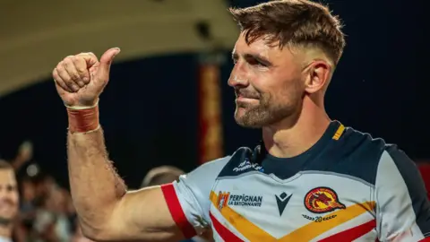Tammy Makinson gives a thumbs up after a match for Catalans Dragons