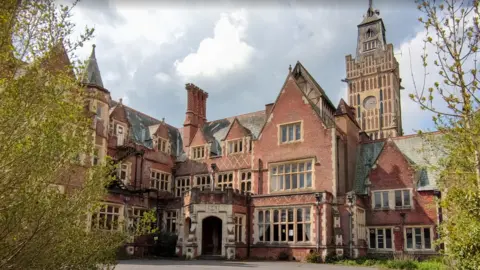 Aldermaston Court in Berkshire is a Grade II listed early Victorian building. It has red bricks and stone mullens round the windows and doors.