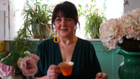 Louise Allen pictured with a cup of tea