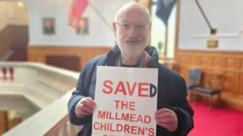 Barry Lewis, Independent councillor for Margate, holding a placard