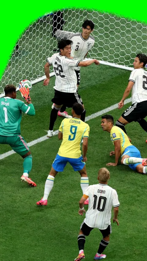 Scramble on the Japanese goal line