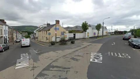 Google A Google Street View image of the junction of Lower Main Street and St Orans Road in Buncrana, County Donegal. 