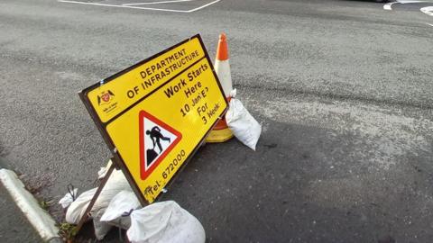 Road sign warning of the road works