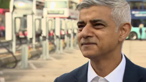 BBC Sadiq Khan speaking to a reporter behind the camera