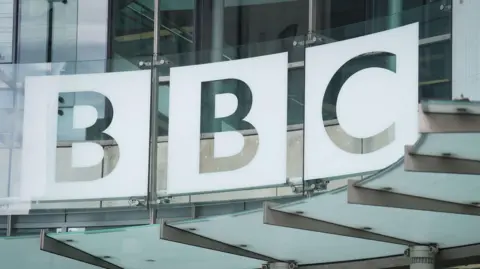 A view of the BBC logo outside of New Broadcasting House 