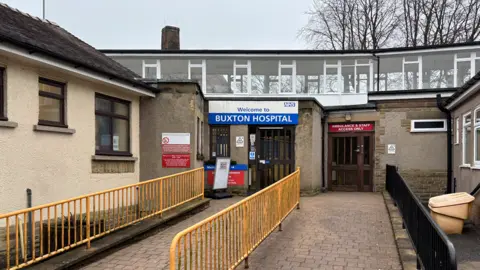 Buxton Hospital on London Road is pictured with a sign saying Welcome to Buxton Hospital