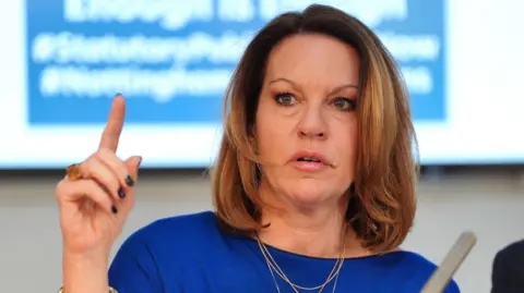 Jonathan Brady/PA Wire Emma Webber, the mother of Barnaby Webber, speaking to the media during a press conference with the families of the victims of the Valdo Calocane, at Doughty Street Chambers, central London.