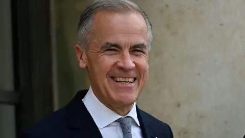 
Meeting Between Prime Minister Of Canada And French President In Paris
Prime Minister of Canada Mark Carney arrives for a meeting at the Presidential Elysee Palace in Paris, France, on June 12, 2026. (Photo by Daniel Pier/NurPhoto via Getty Images)