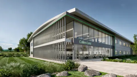 A grey and green building with grass on the left. A sign says 'Callen-Lenz'