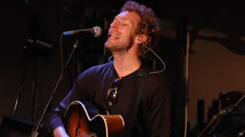 Chris Martin of Coldplay on the BBC live in the studios in 2005