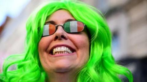 Woman dressed up for St Patrick's Day