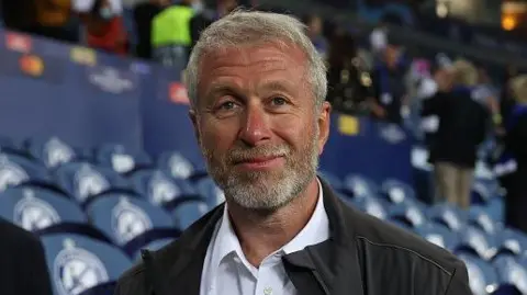 Getty Images Roman Abramovich, owner of Chelsea smiles following his team's victory during the UEFA Champions League Final between Manchester City and Chelsea FC at Estadio do Dragao on May 29, 2021 in Porto, Portugal.