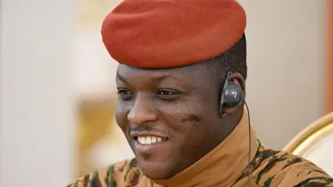 Burkina Faso President Ibrahim Traoré in a red beret and military uniform