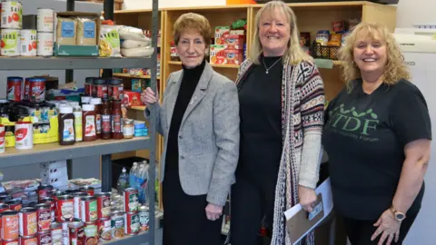 Staff at the social supermarket