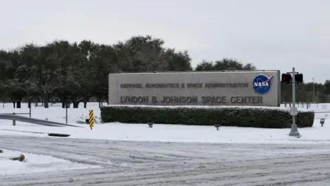 Getty Images The exterior of the Johnson Space Centre, there is snow on the gorund.