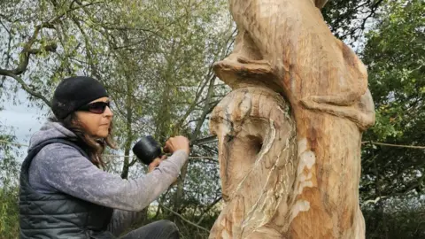 Natasha Houseago Artist Natasha Houseago carving the sculpture.