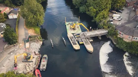 Drone shot of the bridge being demolished