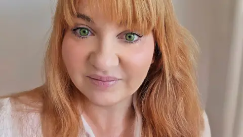 Marika Gorbat Selfie of Marika Gorbat. She has long dark blonde hair and green eyes.