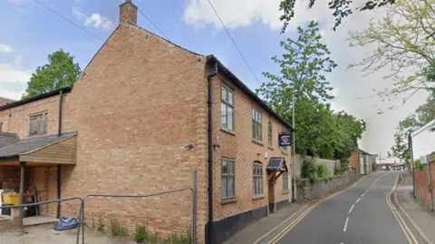 A streetview of the building in Rothley.