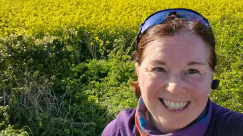 Nic Byrne Nic Byrne, 53, smiling into the camera 