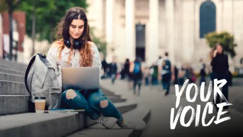 A stock image shows a young woman sitting on outdoor stone steps using a laptop, with a backpack and drink beside them. A busy urban scene with historic architecture and people walking forms the backdrop. The BBC branding for “YOUR VOICE” appears in bold lettering on the right.