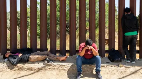 Getty Images Migrants at the US-Mexico border