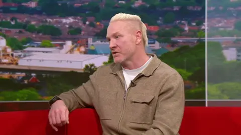Iwan Thomas on the South Today sofa.