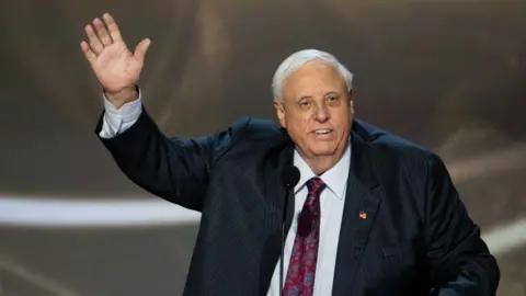 Getty Images Jim Justice waves at the Republican National Convention