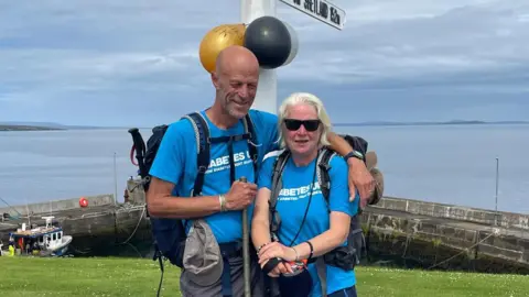 Lisa Sutton Mr and Mrs Sutton at John O'Groats