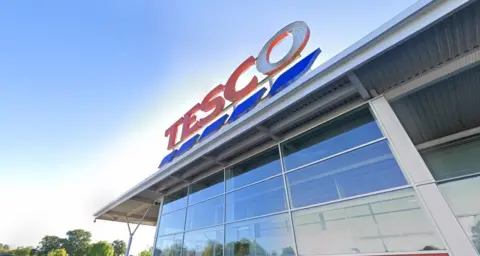 The Tesco sign on the store in Cullompton
