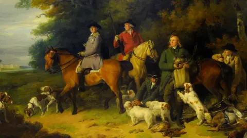 Sheffield Museums Painting showing five people, two on horseback, with numerous dogs around them and extensive parkland behind