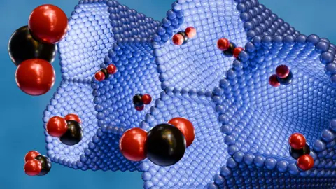 Getty Images A 3D rendering of structure metal-organic framework in purple, red and black 
