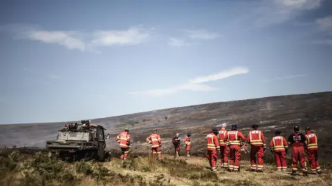 Firefighters on a moor