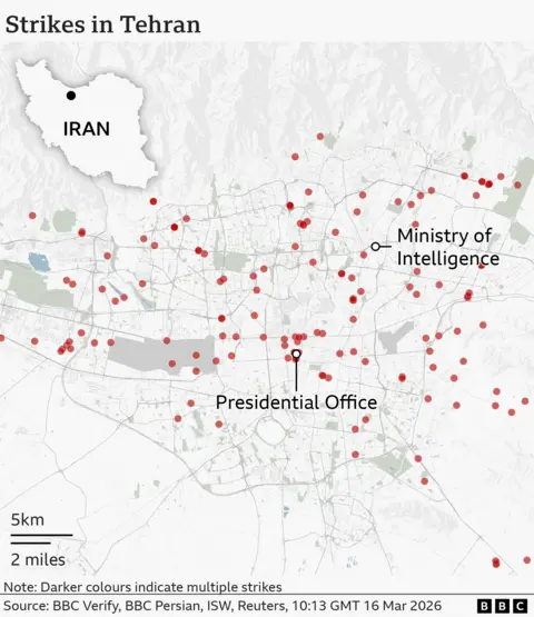 A detailed street‑map of Tehran showing locations marked with red dots indicating strike sites. In the northern part of the city, one marker sits at the Ministry of Intelligence. Farther south, a cluster of markers indicates multiple strikes near the Presidential Office. To the east, there is another individual strike marker. An inset map in the upper left indicates that Tehran sits in the north of Iran.