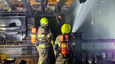 South Yorkshire Fire Service Firefighters tackling blaze