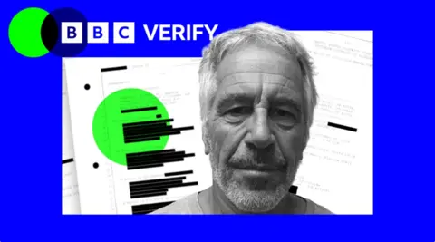 An older man close-up, in front of files with parts of the text blacked out.