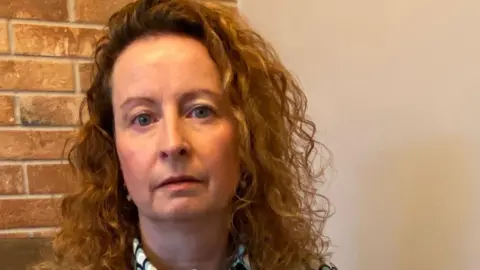 Emma Johnson Woman with gift card